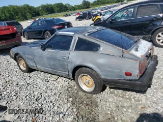 1982 Datsun 280ZX z VIN JN1HZ04S1CX447813, wystawiony jako Copart lot #56649125 z przebiegiem 285 290 mil mil oraz Tytuł czysty. Historia ofert i sprzedaży dostępna na DreamBid. Obrazek 2.