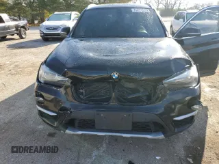 2016 BMW X1 xDrive28i z VIN WBXHT3C35G5E50005, wystawiony jako Copart lot #74476533 z przebiegiem 128 031 mil mil oraz Szkoda całkowita • Salvage title. Historia ofert i sprzedaży dostępna na DreamBid. Obrazek 12.