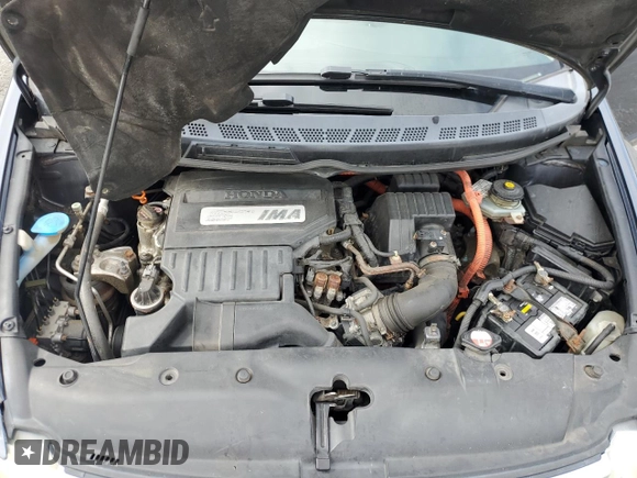 2006 Honda Civic z VIN JHMFA362X6S021709, wystawiony jako Copart lot #58957005 z przebiegiem 228 757 mil mil oraz Szkoda całkowita • Salvage title. Historia ofert i sprzedaży dostępna na DreamBid. Obrazek 11.