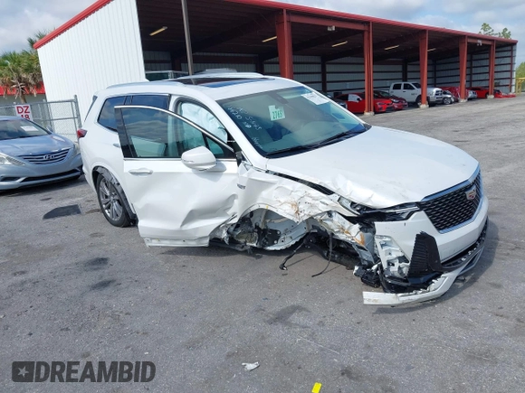 2023 Cadillac XT6 FWD Premium Luxury with VIN 1GYKPCRS3PZ186210, listed as a IAAI auction lot 42290027 with 44,117 mi miles and . Bid and sale history available at DreamBid. Image 1.