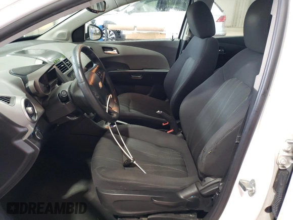 2015 Chevrolet Sonic LT with VIN 1G1JC5SGXF4126055, listed as a Copart auction lot 59579035 with 169,985 mi miles and Salvage title. Bid and sale history available at DreamBid. Image 7.