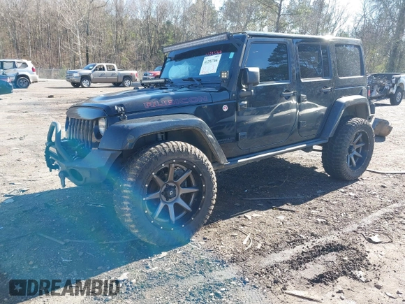 2015 Jeep Wrangler Unlimited Rubicon with VIN 1C4BJWFG9FL755152, listed as a IAAI auction lot 41293766 with 109,153 mi miles. Bid and sale history available at carsss.com. Image 18.