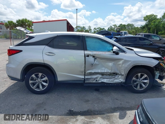 2018 Lexus RX 350 with VIN 2T2ZZMCA3JC094080, listed as a IAAI auction lot 42610883 with 80,046 mi miles and . Bid and sale history available at DreamBid. Image 14.
