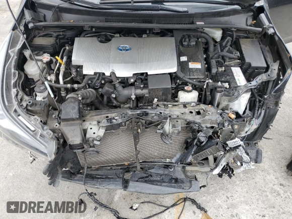 2021 Toyota Prius L Eco z VIN JTDKAMFU2M3148890, wystawiony jako Copart lot #60064065 z przebiegiem 58 226 mil mil oraz Szkoda całkowita • Salvage title. Historia ofert i sprzedaży dostępna na DreamBid. Obrazek 11.