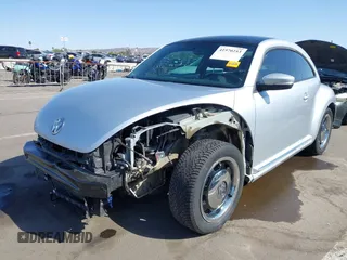 2013 Volkswagen Beetle 2.5L w/Sun/Sound/Nav with VIN 3VWJX7AT5DM606119, listed as a IAAI auction lot 41970253 with 81,004 mi miles and . Bid and sale history available at DreamBid. Image 6.