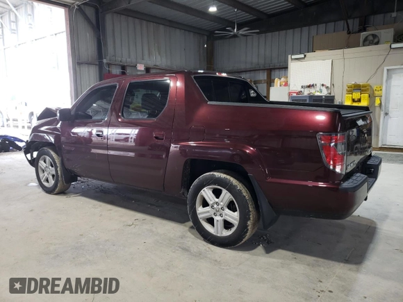 2013 Honda Ridgeline RTL with VIN 5FPYK1F59DB018582, listed as a Copart auction lot 61022245 with 126,892 mi miles and Salvage title. Bid and sale history available at DreamBid. Image 2.
