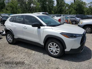 2024 Toyota Corolla Cross L with VIN 7MUAAAAG6RV105158, listed as a Copart auction lot 60271015 with 7,294 mi miles and Salvage title. Bid and sale history available at DreamBid. Image 4.