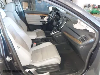 2018 Honda CR-V Touring with VIN 2HKRW2H94JH635053, listed as a IAAI auction lot 41611501 with 76,883 mi miles. Bid and sale history available at carsss.com. Image 5.