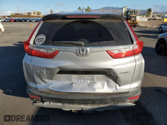 2018 Honda CR-V LX z VIN 2HKRW6H3XJH203604, wystawiony jako Copart lot #89002705 z przebiegiem 77 628 mil mil oraz Szkoda całkowita • Salvage title. Historia ofert i sprzedaży dostępna na DreamBid. Obrazek 6.