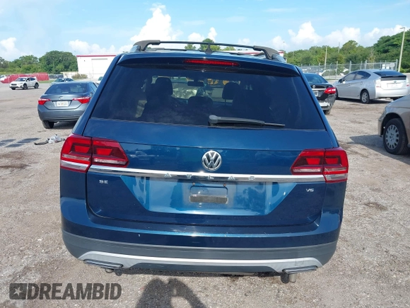 2018 Volkswagen Atlas SE with VIN 1V2CR2CA1JC561003, listed as a IAAI auction lot 42556798 with 124,147 mi miles and . Bid and sale history available at DreamBid. Image 16.