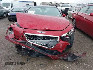 2021 Genesis G70 2.0T with VIN KMTG44LA0MU075456, listed as a IAAI auction lot 42212601 with 19,503 mi miles and . Bid and sale history available at DreamBid. Image 12.