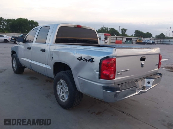 2005 Dodge Dakota SLT with VIN 1D7HW48N35S310086, listed as a IAAI auction lot 42020235 with 267,357 mi miles and . Bid and sale history available at DreamBid. Image 3.