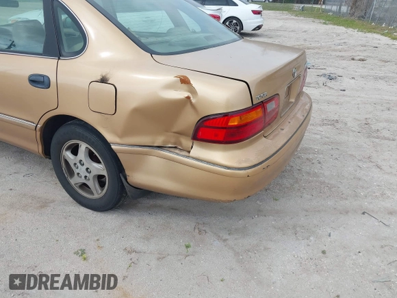 1998 Toyota Avalon XL with VIN 4T1BF18B0WU265372, listed as a IAAI auction lot 41620179 with Not Provided miles and . Bid and sale history available at DreamBid. Image 6.