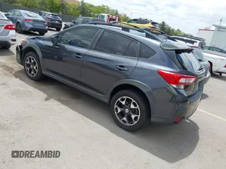 2018 Subaru Crosstrek Premium z VIN JF2GTACC9JH215303, wystawiony jako IAAI lot #42228185 z przebiegiem 71 170 mil mil oraz . Historia ofert i sprzedaży dostępna na DreamBid. Obrazek 3.