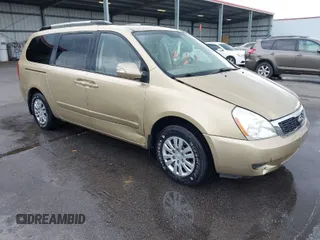 2011 Kia Sedona LX with VIN KNDMG4C71B6407306, listed as a IAAI auction lot 41922697 with 243,248 mi miles. Bid and sale history available at carsss.com. Image 1.