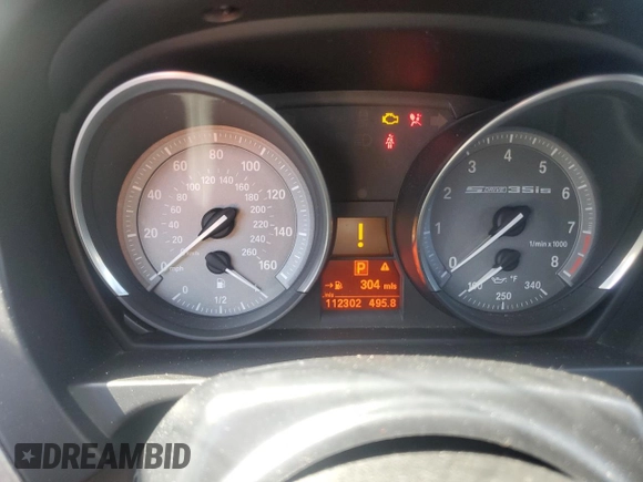 2011 BMW Z4 sDrive35is with VIN WBALM1C54BE633439, listed as a Copart auction lot 60327265 with 112,302 mi miles and Salvage title. Bid and sale history available at DreamBid. Image 9.