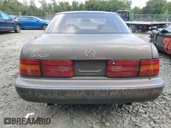 1992 Lexus LS z VIN JT8UF11E6N0128376, wystawiony jako Copart lot #70445094 z przebiegiem 144 806 mil mil oraz Nie do naprawy • Non repairable. Historia ofert i sprzedaży dostępna na DreamBid. Obrazek 6.