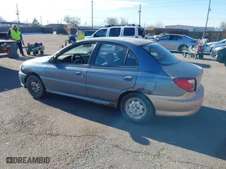 2001 Kia Rio with VIN KNADC123516046473, listed as a IAAI auction lot 41453919 with 193,582 mi miles. Bid and sale history available at carsss.com. Image 3.