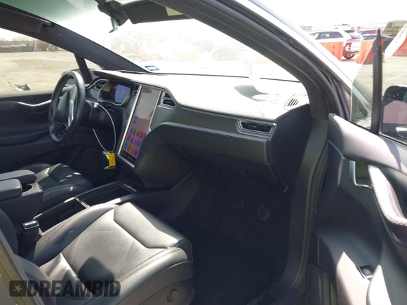 2017 Tesla Model X 90D with VIN 5YJXCBE22HF079194, listed as a IAAI auction lot 41895591 with 102,437 mi miles and . Bid and sale history available at DreamBid. Image 5.