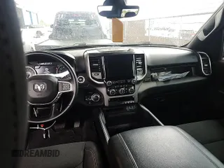 2023 Ram 1500 Big Horn with VIN 1C6RRFFG1PN560991, listed as a IAAI auction lot 42806487 with 97,774 mi miles and . Bid and sale history available at DreamBid. Image 1.