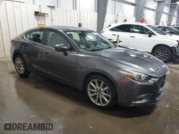 2017 Mazda 3 Touring with VIN 3MZBN1V74HM149040, listed as a Copart auction lot 59917855 with 204,440 mi miles and Salvage title. Bid and sale history available at DreamBid. Image 4.