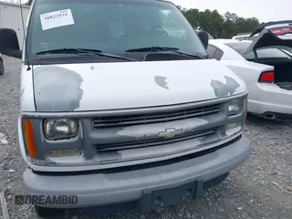 2002 Chevrolet Express with VIN 1GAHG39R921177847, listed as a IAAI auction lot 38822931 with 48,275 mi miles. Bid and sale history available at carsss.com. Image 6.