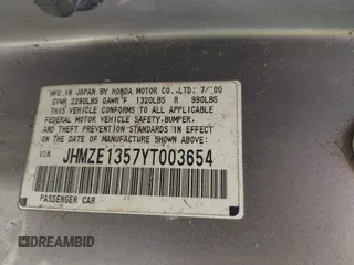 2000 Honda Insight z VIN JHMZE1357YT003654, wystawiony jako IAAI lot #42428076 z przebiegiem 173 445 mil mil oraz . Historia ofert i sprzedaży dostępna na DreamBid. Obrazek 9.