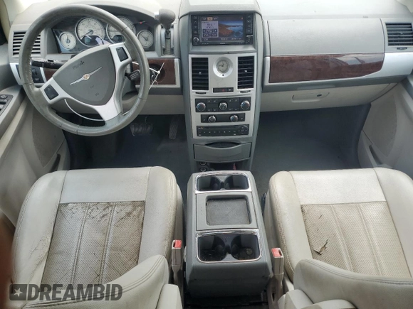 2009 Chrysler Town & Country Touring with VIN 2A8HR54X39R667914, listed as a Copart auction lot 66010904 with 214,583 mi miles and Salvage Title. Bid and sale history available at DreamBid. Image 8.