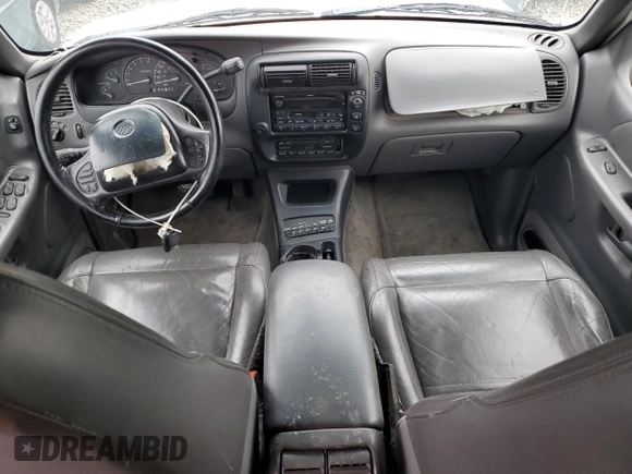 2000 Mercury Mountaineer z VIN 4M2ZU86P9YUJ19811, wystawiony jako Copart lot #82211724 z przebiegiem 251 761 mil mil oraz Szkoda całkowita • Salvage title. Historia ofert i sprzedaży dostępna na DreamBid. Obrazek 8.