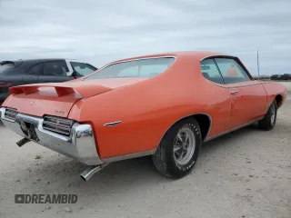 1969 Pontiac GTO z VIN 242379P309028, wystawiony jako Copart lot #75516494 z przebiegiem 597 mil mil oraz Nie do naprawy • Non repairable. Historia ofert i sprzedaży dostępna na DreamBid. Obrazek 3.