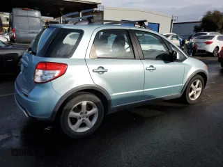 2009 Suzuki SX4 Man AWD with VIN JS2YB413596200773, listed as a Copart auction lot 82515174 with 144,847 mi miles and Clean Title. Bid and sale history available at carsss.com. Image 3.