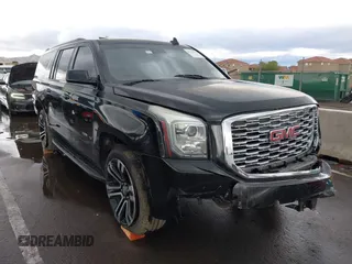 2019 GMC Yukon XL SLT with VIN 1GKS1GKC7KR155668, listed as a IAAI auction lot 41751792 with 163,537 mi miles. Bid and sale history available at carsss.com. Image 1.