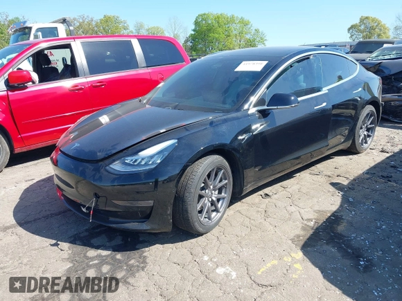 2020 Tesla Model 3 Long Range z VIN 5YJ3E1EB3LF622290, wystawiony jako IAAI lot #41978398 z przebiegiem 59 127 mil mil oraz . Historia ofert i sprzedaży dostępna na DreamBid. Obrazek 16.