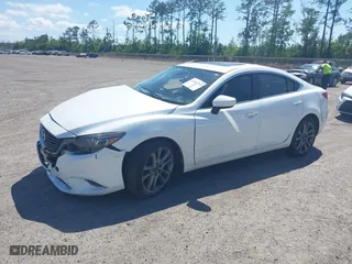 2016 Mazda Mazda6 i Grand Touring with VIN JM1GJ1W55G1443186, listed as a IAAI auction lot 42063716 with 114,263 mi miles. Bid and sale history available at carsss.com. Image 2.