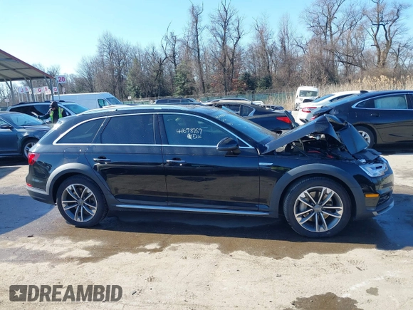 2019 Audi A4 allroad Premium Plus z VIN WA18NAF42KA009729, wystawiony jako IAAI lot #41698959 z przebiegiem 60 893 mil mil oraz . Historia ofert i sprzedaży dostępna na DreamBid. Obrazek 13.