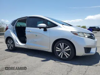 2016 Honda Fit EX with VIN JHMGK5H79GX020531, listed as a Copart auction lot 60224965 with 98,295 mi miles and Salvage title. Bid and sale history available at DreamBid. Image 4.