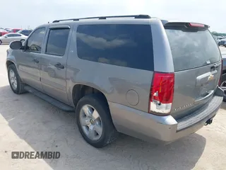 2007 Chevrolet Suburban LS with VIN 1GNFC160X7J233586, listed as a IAAI auction lot 42165186 with 240,183 mi miles and . Bid and sale history available at DreamBid. Image 3.