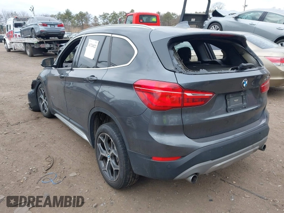2017 BMW X1 sDrive28i with VIN WBXHU7C39H5H36722, listed as a IAAI auction lot 41724022 with 33,412 mi miles. Bid and sale history available at carsss.com. Image 3.