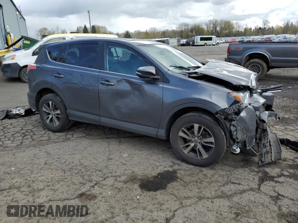 2018 Toyota RAV4 XLE with VIN 2T3RFREV2JW791353, listed as a Copart auction lot 51588515 with 126,830 mi miles and Salvage Title. Bid and sale history available at DreamBid. Image 4.