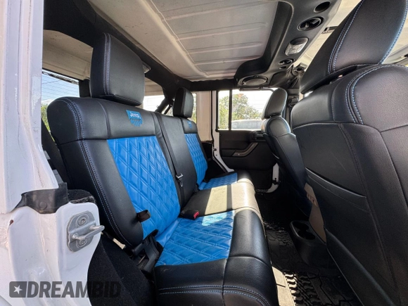 2012 Jeep Wrangler Unlimited Altitude z VIN 1C4HJWEG5CL222948, wystawiony jako Copart lot #61101825 z przebiegiem 106 991 mil mil oraz Czysty tytuł • Clean title. Historia ofert i sprzedaży dostępna na DreamBid. Obrazek 6.