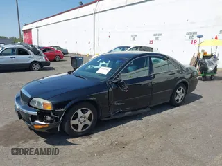 2001 Lincoln LS z VIN 1LNHM86S71Y620289, wystawiony jako IAAI lot #42105386 z przebiegiem 74 148 mil mil oraz . Historia ofert i sprzedaży dostępna na DreamBid. Obrazek 2.