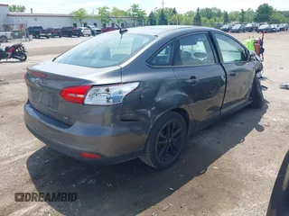 2017 Ford Focus SE with VIN 1FADP3F2XHL235013, listed as a IAAI auction lot 42370565 with 112,276 mi miles and . Bid and sale history available at DreamBid. Image 4.