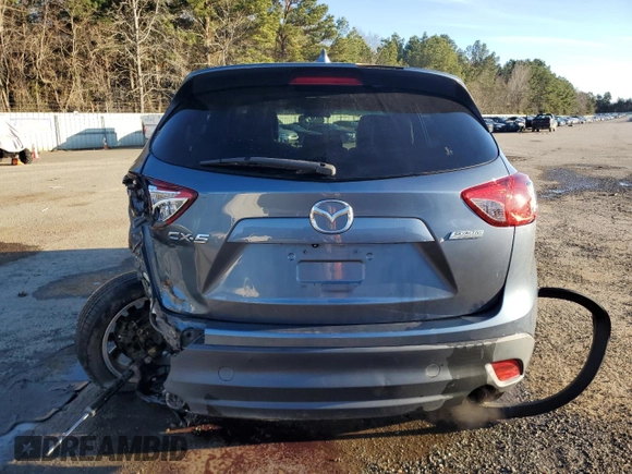 2015 Mazda CX-5 Grand Touring with VIN JM3KE2DY9F0483509, listed as a Copart auction lot 87406944 with 176,213 mi miles and Salvage Title. Bid and sale history available at carsss.com. Image 6.
