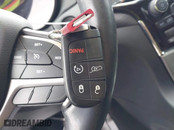 2021 Jeep Grand Cherokee Laredo E with VIN 1C4RJEAG7MC713026, listed as a IAAI auction lot 42010894 with 37,336 mi miles and . Bid and sale history available at DreamBid. Image 11.
