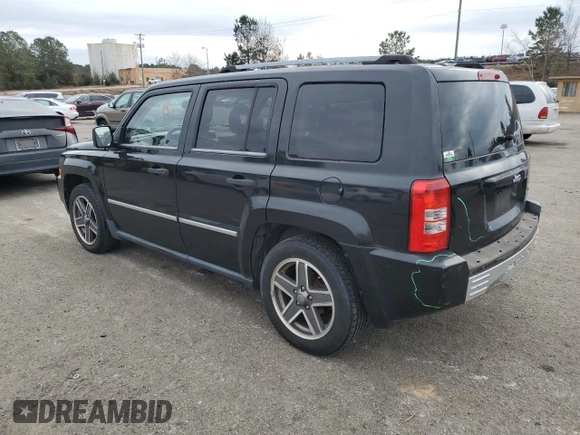 2008 Jeep Patriot Limited with VIN 1J8FT48W68D796610, listed as a Copart auction lot 87911365 with 219,119 mi miles and Salvage Title. Bid and sale history available at DreamBid. Image 2.