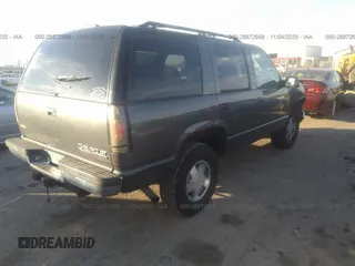 1999 Chevrolet Tahoe Z71 with VIN 1GNEK13R7XJ528100, listed as a IAAI auction lot 28872658 with 158,958 mi miles and . Bid and sale history available at DreamBid. Image 4.