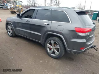2014 Jeep Grand Cherokee Overland with VIN 1C4RJFCGXEC172008, listed as a IAAI auction lot 41719313 with 164,682 mi miles. Bid and sale history available at carsss.com. Image 3.