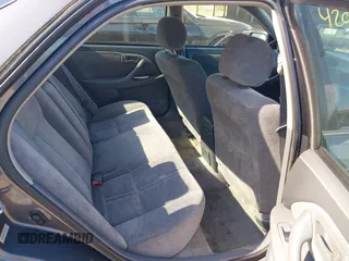 1997 Toyota Camry LE z VIN 4T1BG22K1VU101106, wystawiony jako IAAI lot #42065420 z przebiegiem 121 457 mil mil oraz . Historia ofert i sprzedaży dostępna na DreamBid. Obrazek 8.