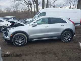 2022 Cadillac XT4 AWD Premium Luxury with VIN 1GYFZDR43NF152561, listed as a IAAI auction lot 41669571 with 16,274 mi miles and . Bid and sale history available at carsss.com. Image 14.