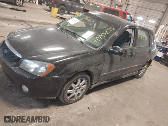 2005 Kia Spectra with VIN KNAFE161255083357, listed as a IAAI auction lot 41445285 with 90,349 mi miles. Bid and sale history available at carsss.com. Image 2.